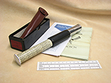 Late 1960's Otis King Model K type C leather cased cylindrical slide rule calculator
